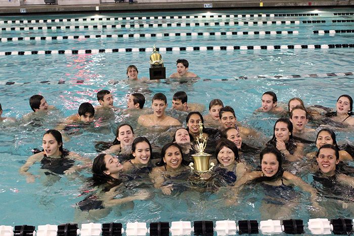 Members of the El Paso High Swim Team celebrate inside the pool.
Staff Photo