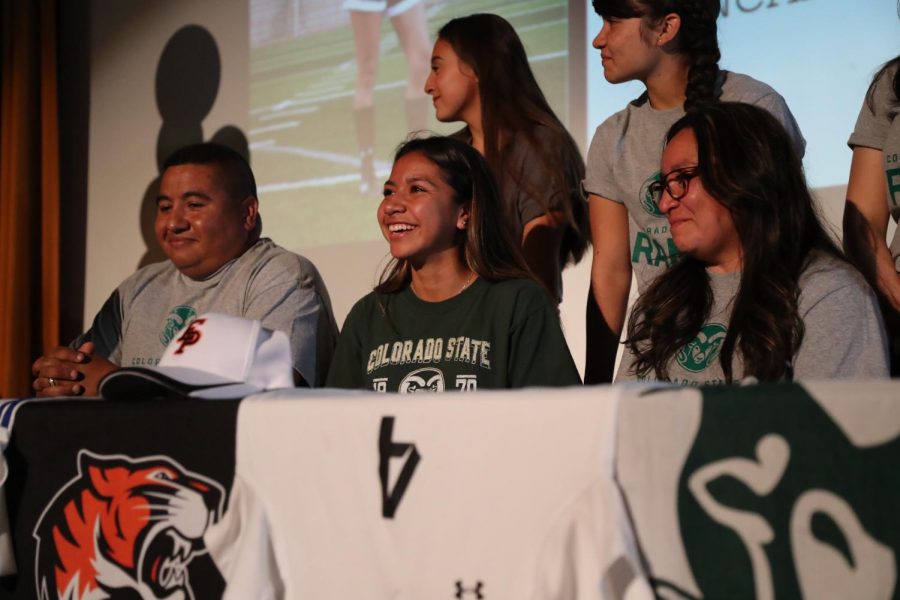 (Feb. 7, 2018) Jackie Balderrama (center) along side her parents looks in excitement as she signed her National Letter of Intent to play collegiate soccer at Colorado State University.