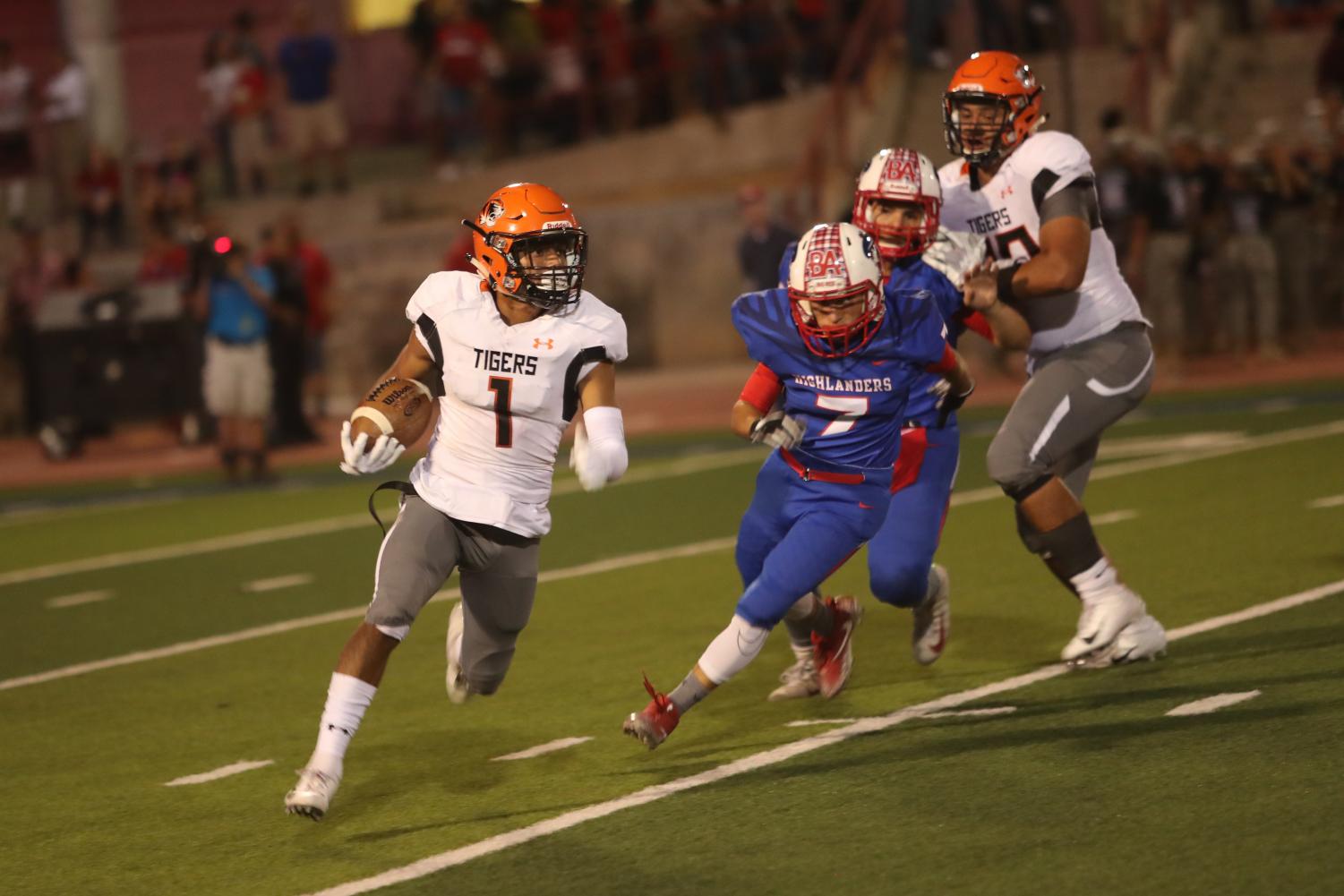 Senior wider receiver, David Gonzalez turns up field during the 35-21 win against Bel Air. Gonzalez finished the game with 10 catches and 137 yards.