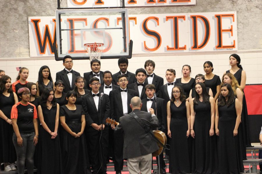 Choir+instructor%2C+Mr.+Thompson+and+his+group%2C+perform+at+the+Veterans+Day+assembly+Nov.+9.