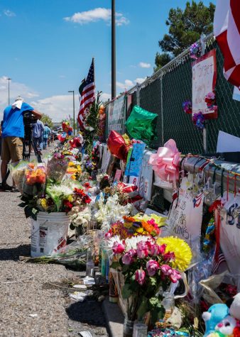 Hundreds of flowers adorn the makeshift memorial behind the Walmart next to Cielo Vista Mall where 22 people were shot and killed on Aug. 3. The site has received daily visits from people all across the region since the tragic event.