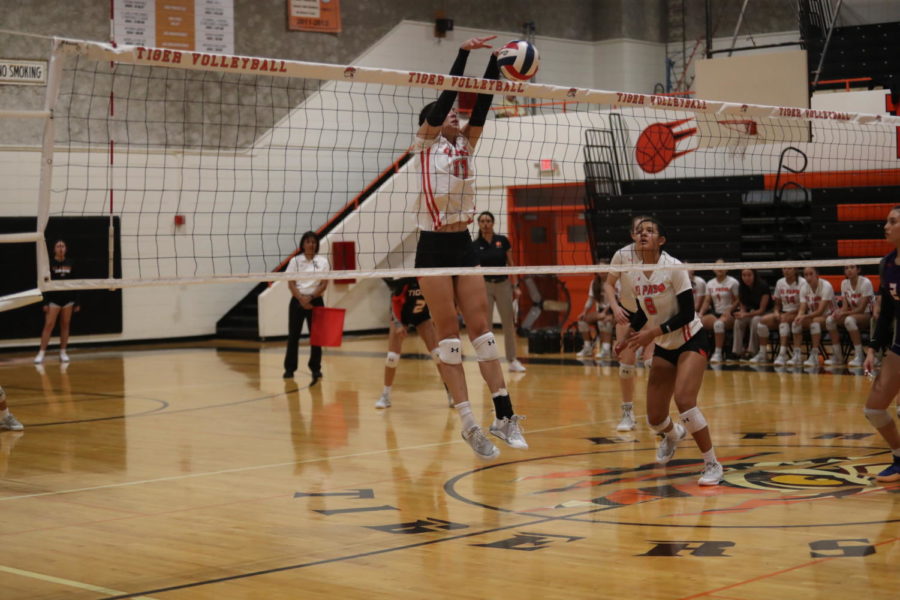 Senior Maddy McGuire goes for a block during their game against Eastlake on Aug. 16.