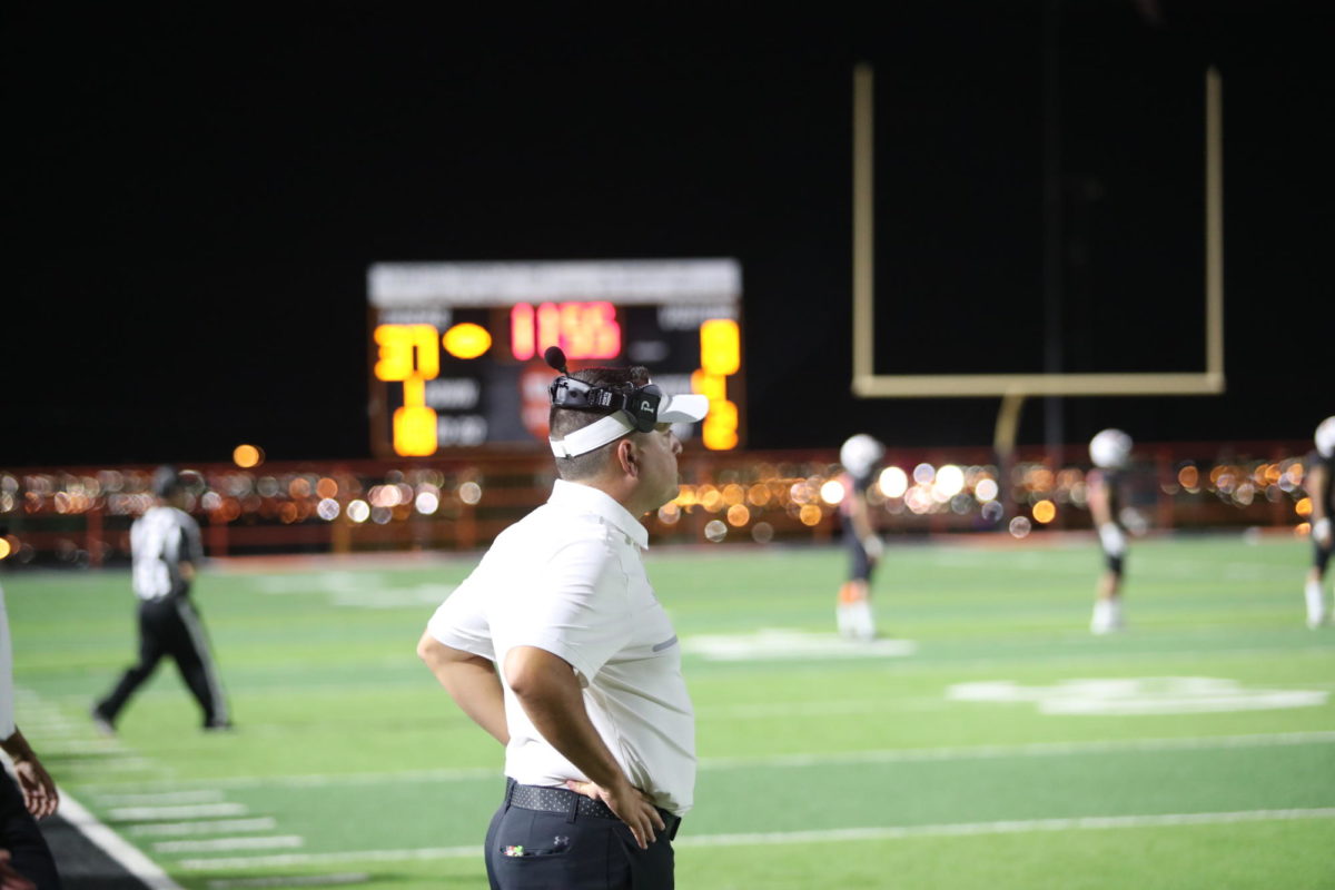 Head Coach Ray Aguilar watches as the Tigers beat San Elizario.