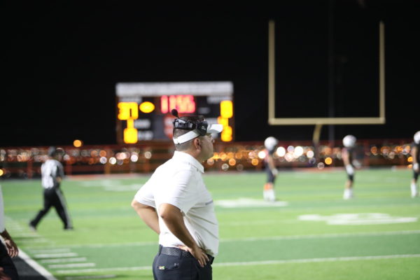 Head Coach Ray Aguilar watches as the Tigers beat San Elizario.