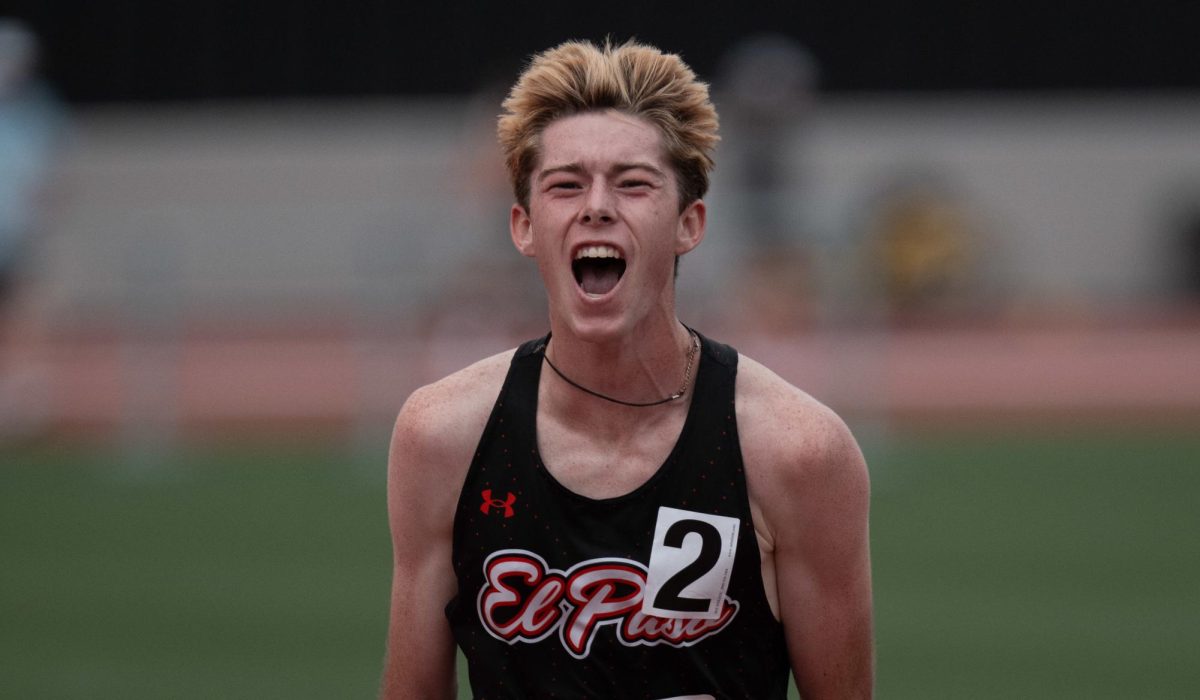 Miles Westbrook yells in excitement after winning the 3200-meter race at the state championships in Austin. 