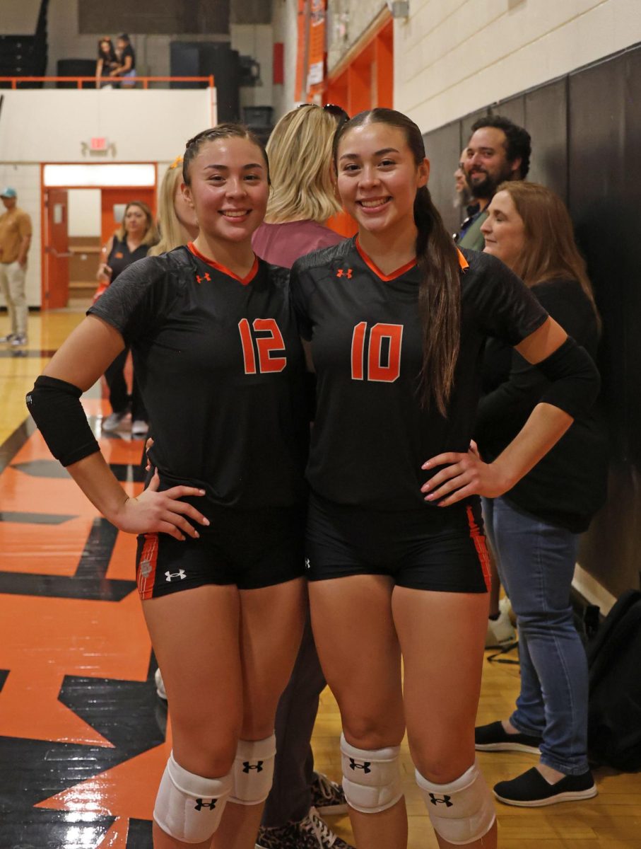 Senior twins, Samaire Muñoz (Left) and Samantha (Right) stand together after their win against Immanuel Christian on August 26, 2025.