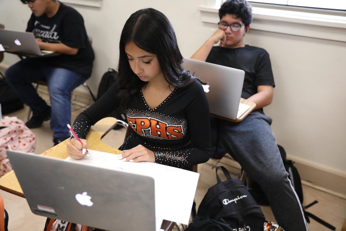 Freshman Jacqueline Cruz is working on a landform project for Mr. Favela's world geography class.