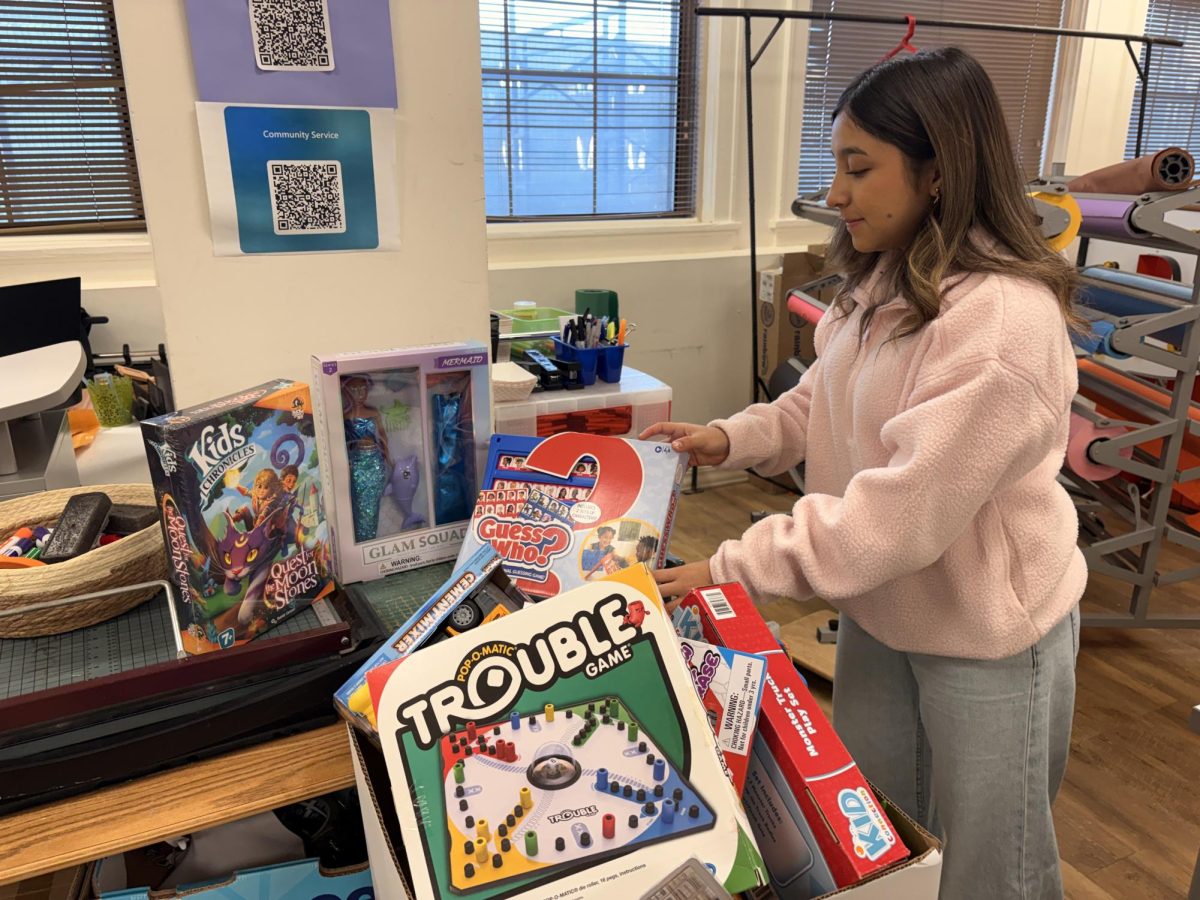 Valeria Hernandez shows off the donations. December 10, 2025 